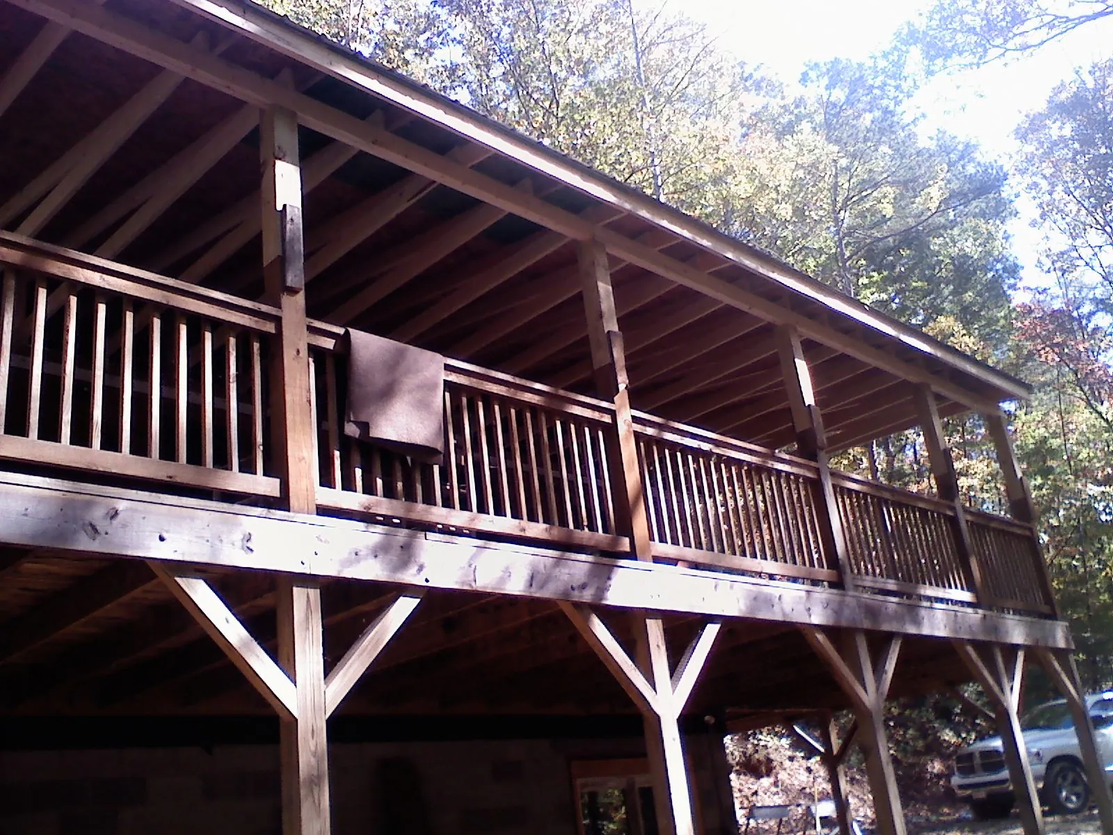 Timber framing under a new elevated porch and deck — Roof Leak Repair in Hewlett by Roofing Brothers